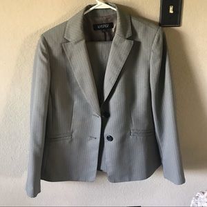 woman’s two piece pant suit